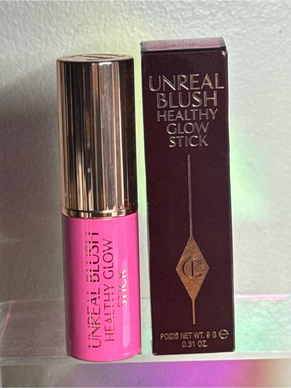 Charlotte Tilbury  Unreal Lip + Cheek Glow Blush Stick pinky glow